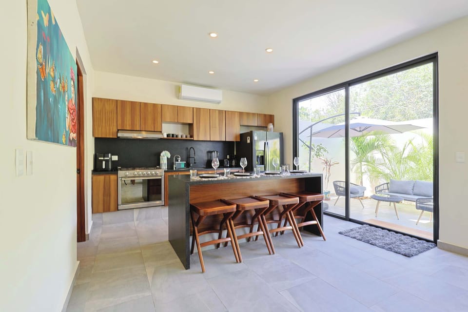 A bright and spacious kitchen awaits your culinary creations.