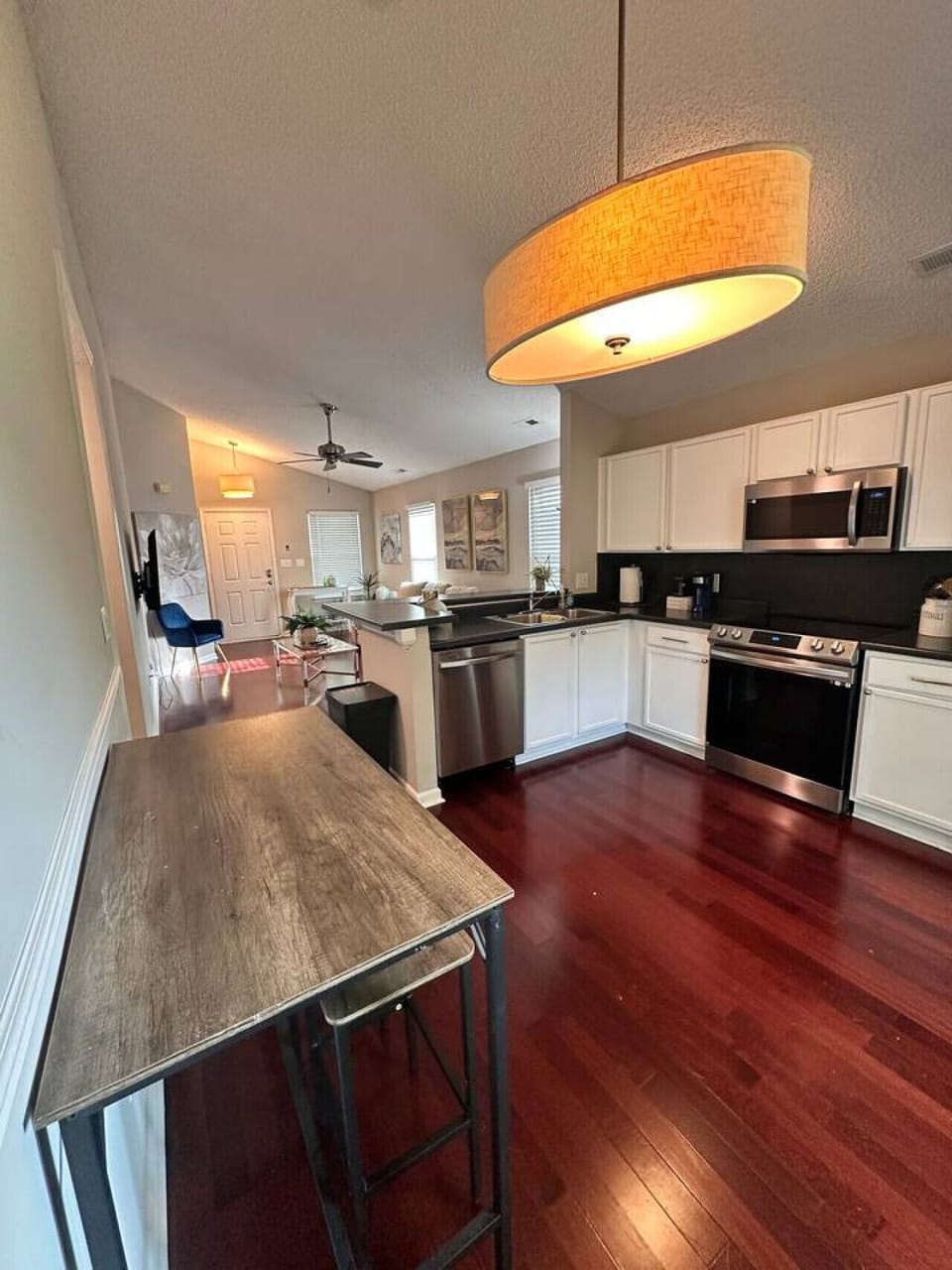 Fully equipped kitchen with stainless steel appliances and everything you need to cook real meals