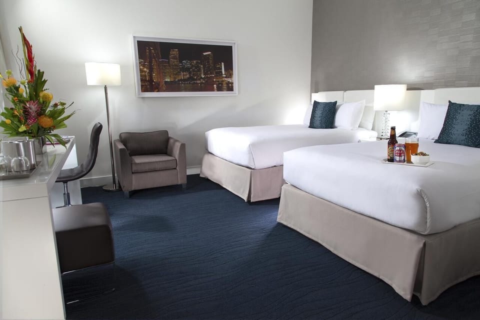 Recharge in a serene room with space to relax and work.
