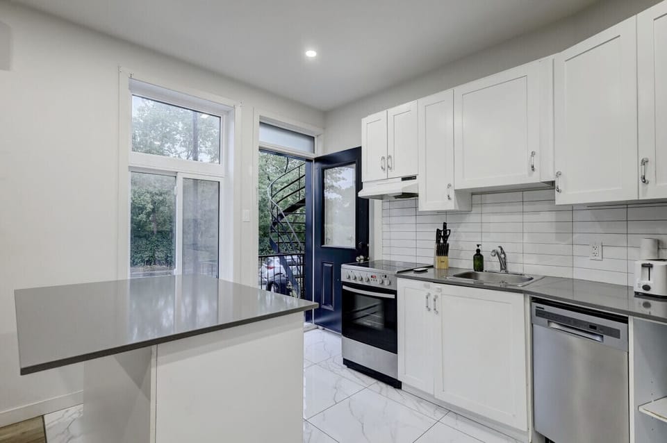 Stylish kitchen with sleek finishes and natural light