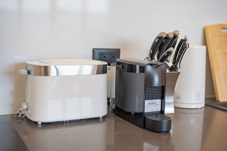 Toaster, coffee machine, kettle. 