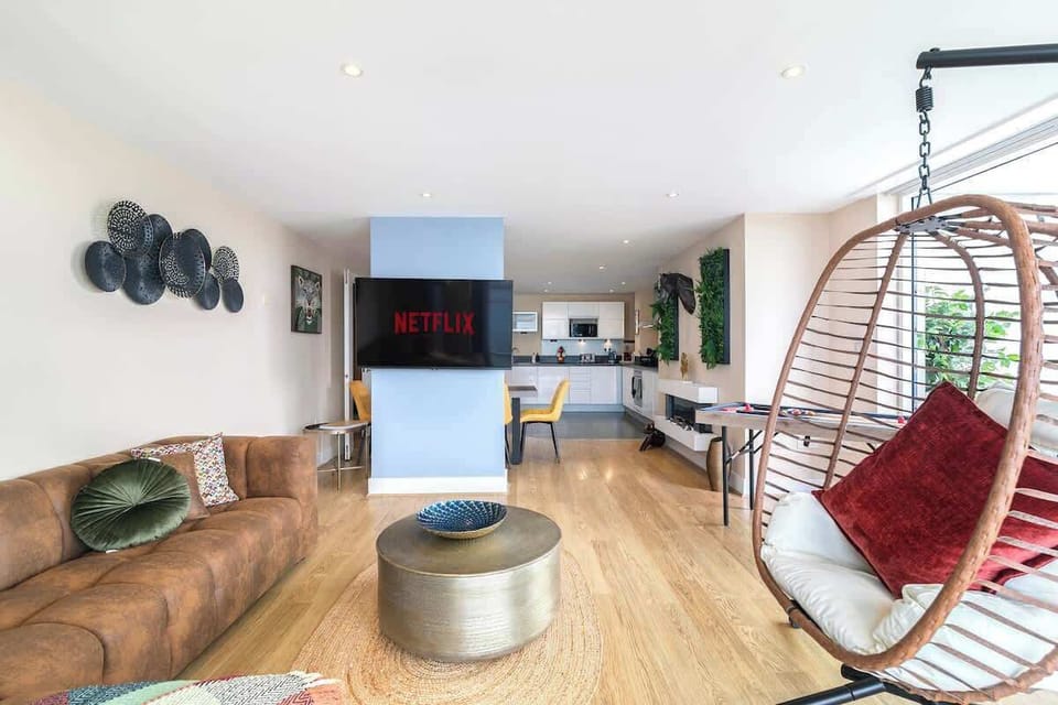 Open-plan living connecting lounge, dining and kitchen
