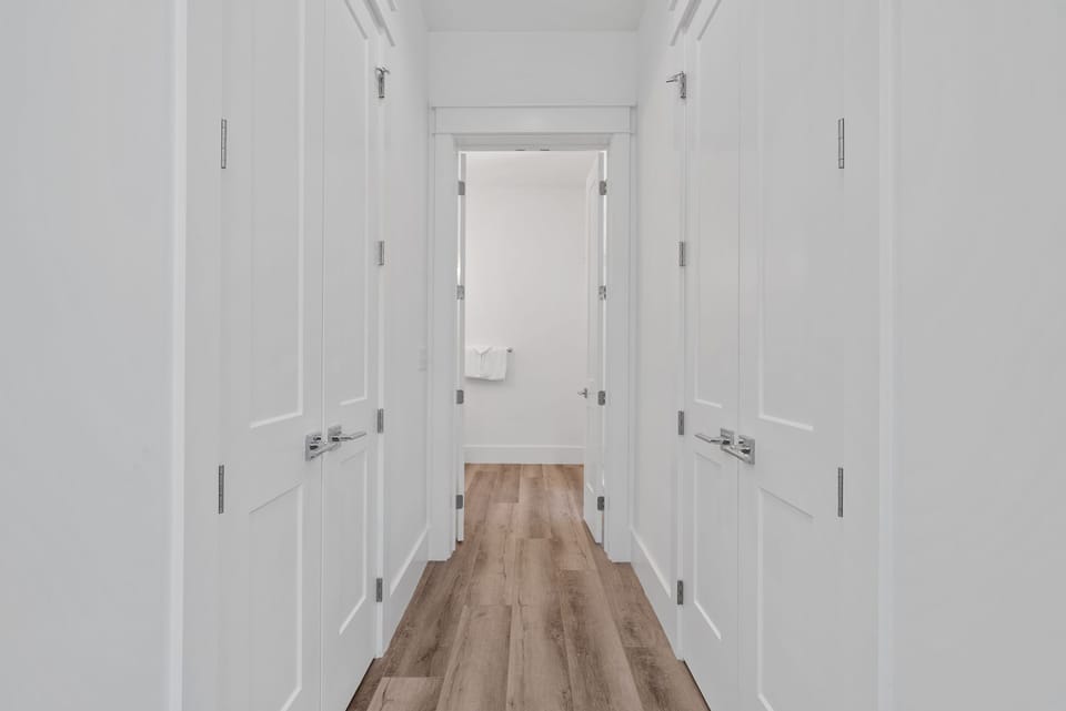 Sea More | Southwest King Ensuite Hallway To Bathroom | 2nd Floor