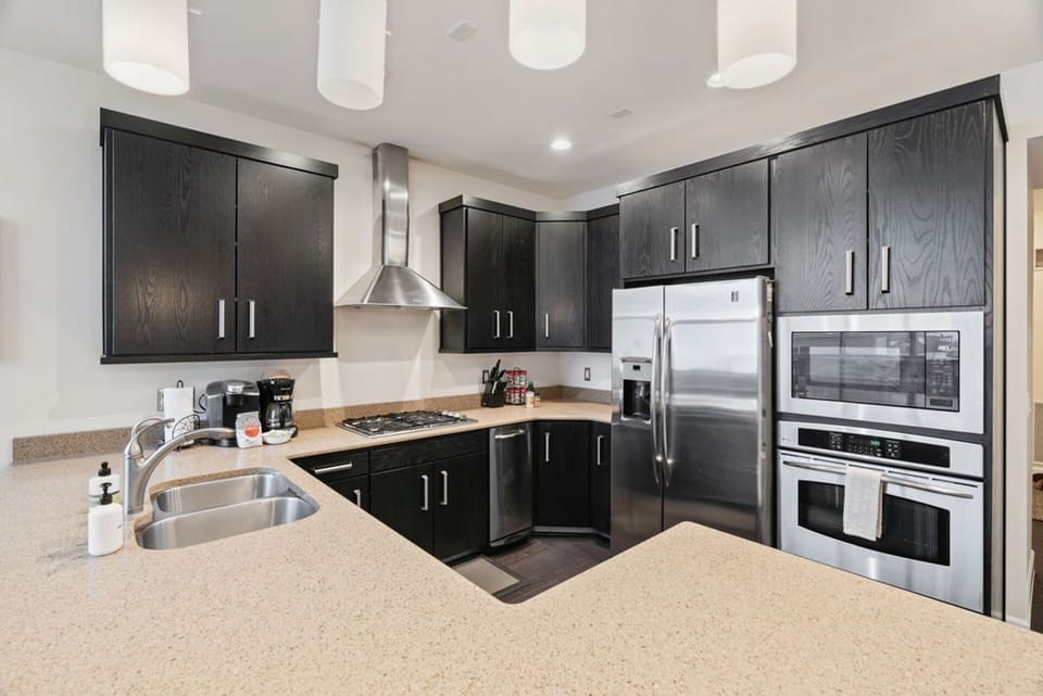 Cook up a storm in the fully equipped kitchen, complete with everything you need for delicious meals and snacks! Perfect for gathering with family and friends. | Giant Steps Retreat, Brian Head, Utah | Voyax Luxury Vacation Rentals