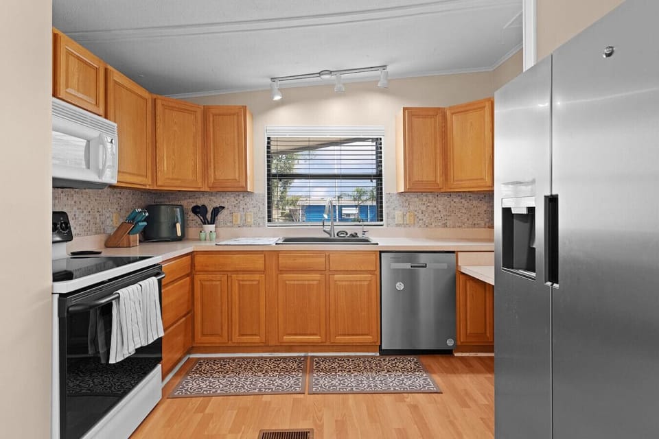 A warm, functional kitchen ready for all your culinary adventures.