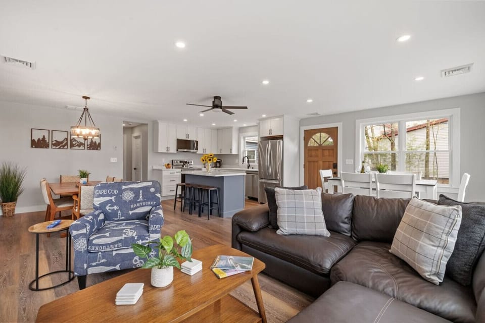 Enjoy modern comfort with connected living, dining, and kitchen spaces