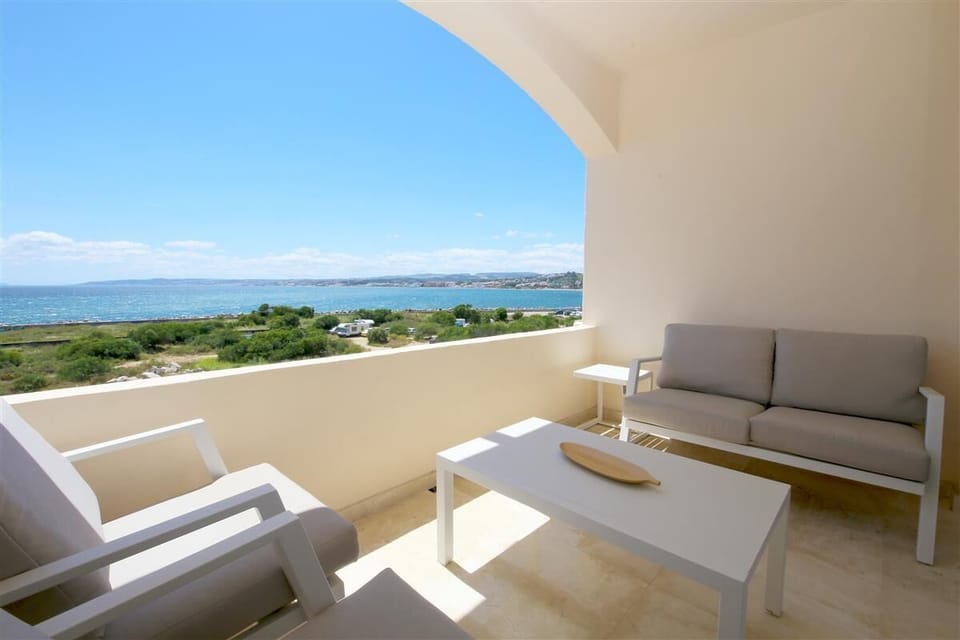 Beautiful private terrace with outdoor seating and sea views