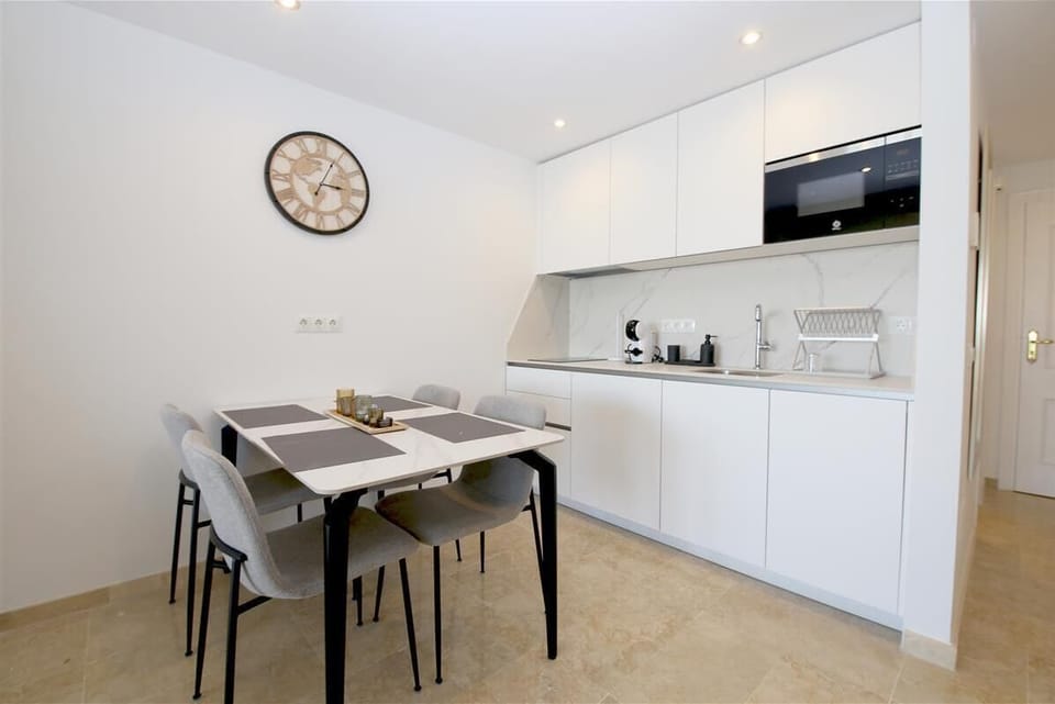 Kitchen in this studio-apartment is very well equipped