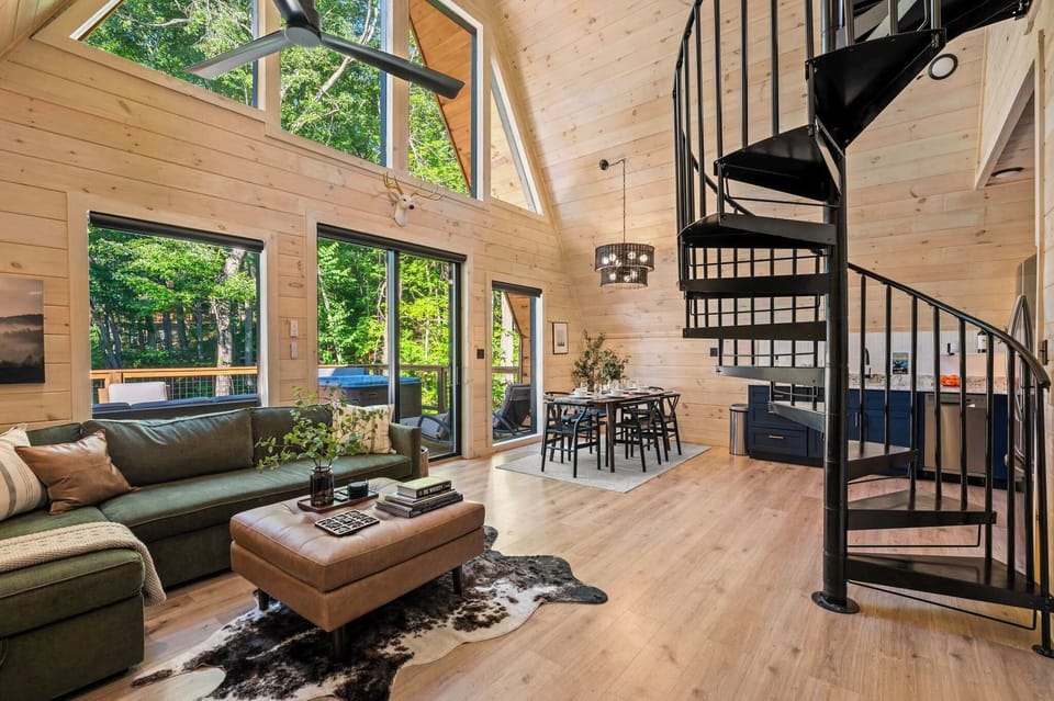 The open-concept living area offers seamless flow and easy access to the outdoors, making it the perfect space to entertain or relax. 