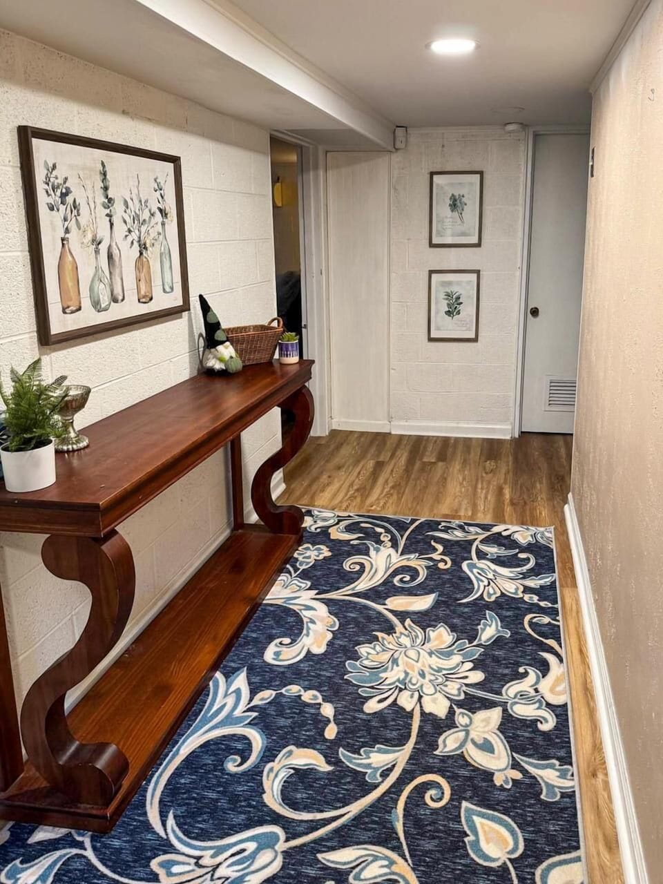 Experience a warm, inviting interior with the natural touch of wood and a simple, elegant painting. The subtle design creates a peaceful atmosphere that feels both timeless and modern.