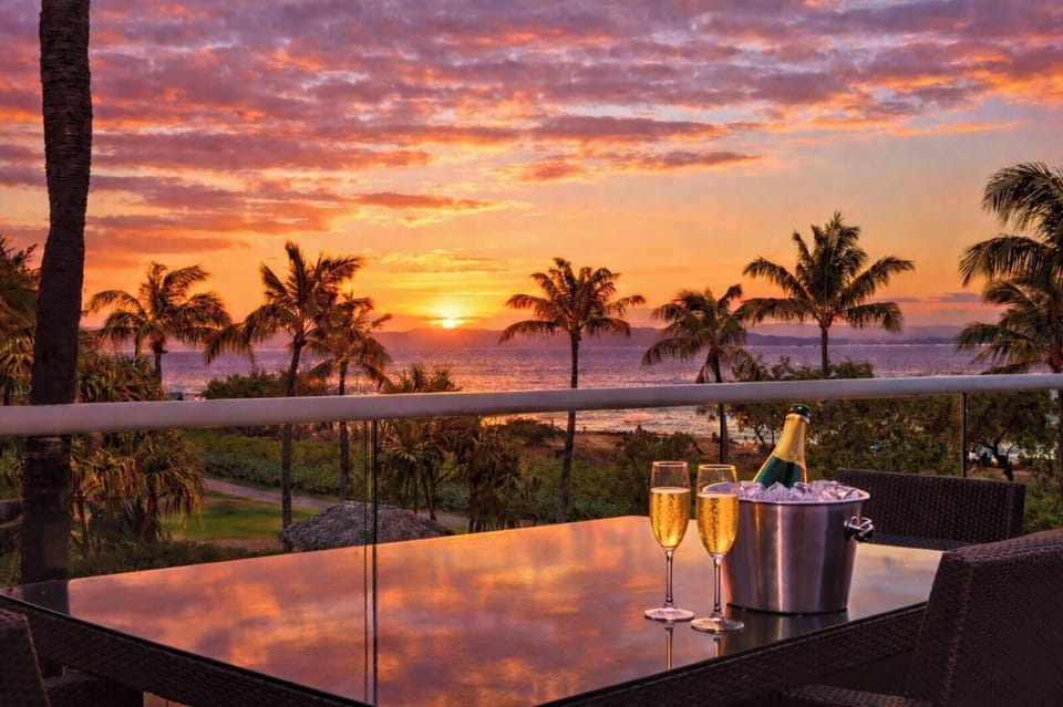 A wide-open private balcony made for happy hour sunset gazing. HKH-204