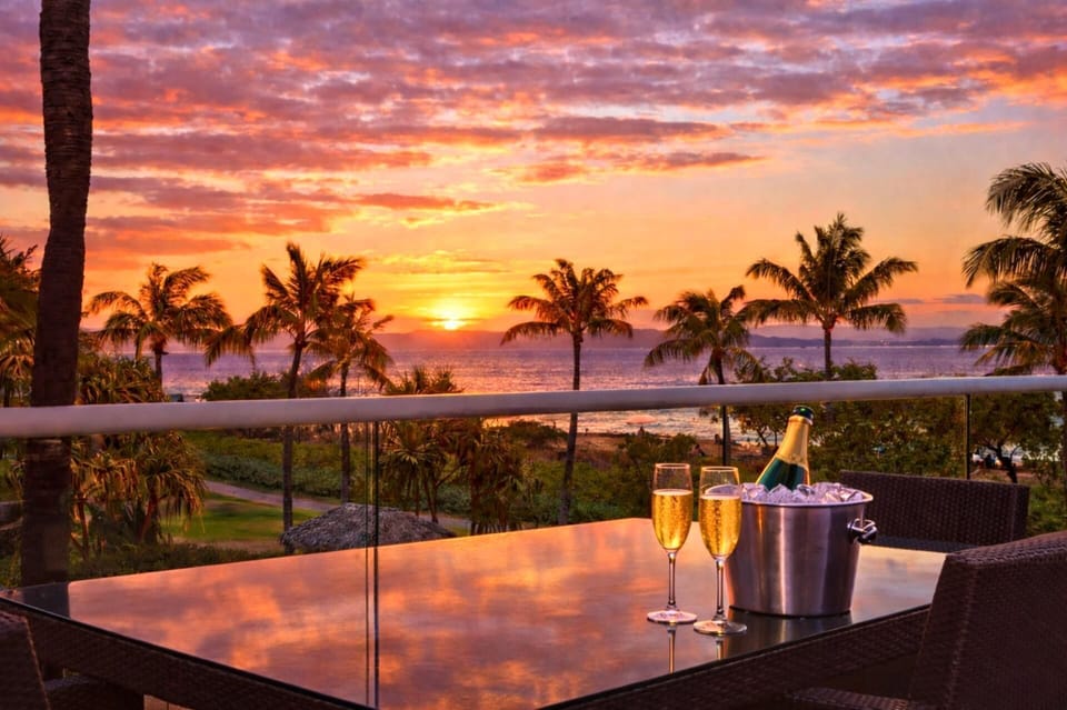 A wide-open private balcony made for happy hour sunset gazing. HKH-204