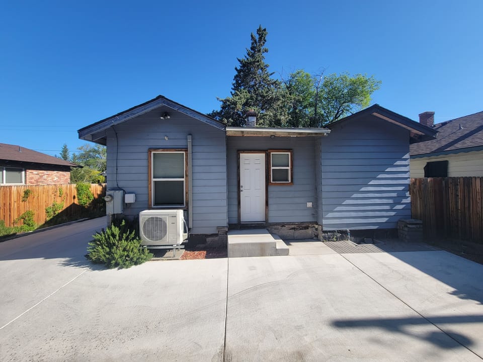 Back of house entrance with rosemary bush that needs to be picked!