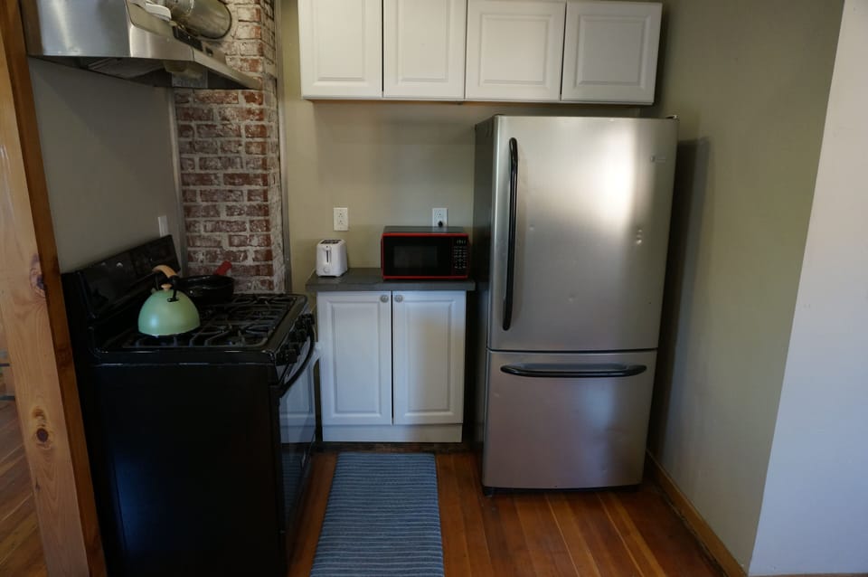 Gas range oven, fridge and microwave