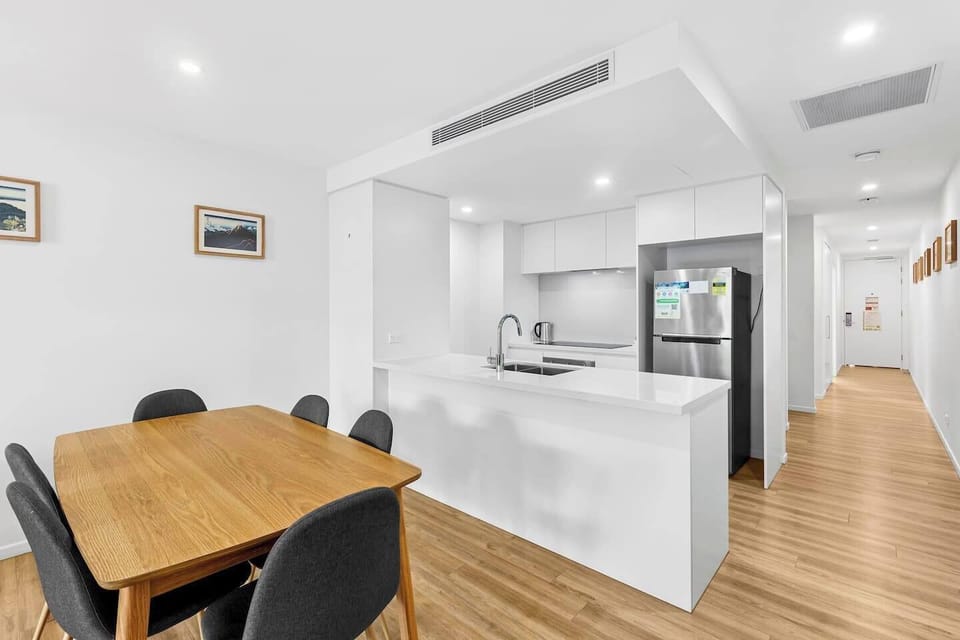 Whip up easy breakfasts or full feasts in a modern kitchen equipped with an oven, dishwasher, stone benchtops and everything needed for home cooking.