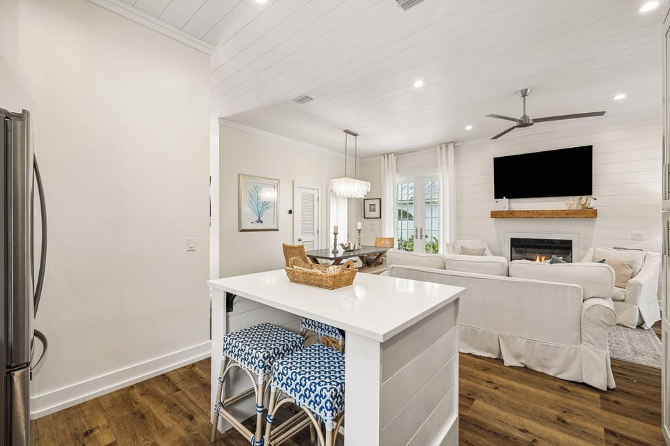 Enjoy an inviting open living space where conversations flow easily from the island to the cozy living room, creating the perfect place to relax and reconnect.