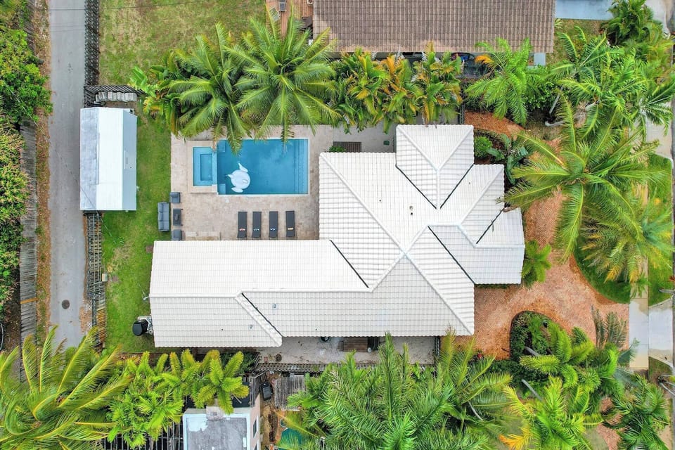 Exterior View: Aerial Serenity: Discover Your Private Oasis from Above