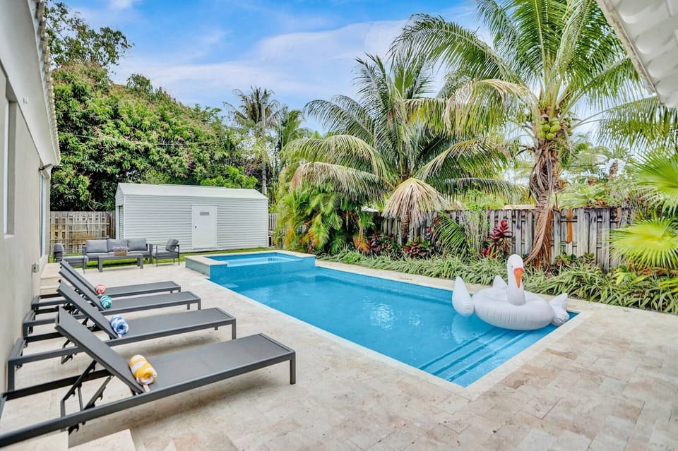 Swimming Pool: Relax by the Pool: Your Private Oasis Awaits with Comfortable Loungers