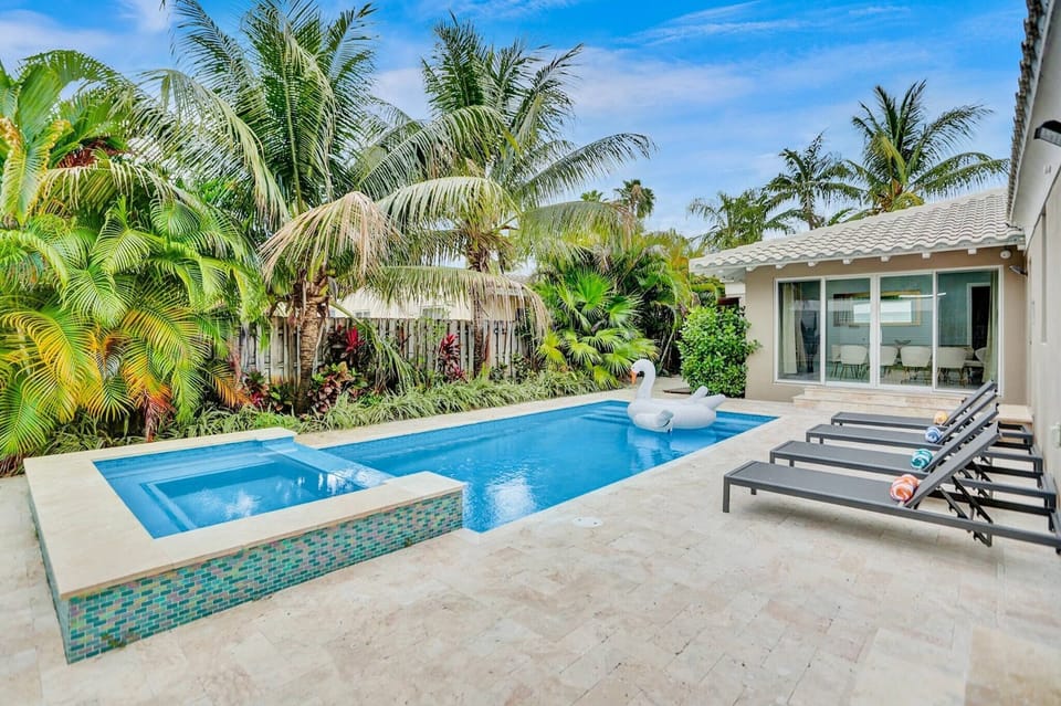Pool Area: Tropical Paradise: Unwind by the Pool in This Lush, Serene Backyard