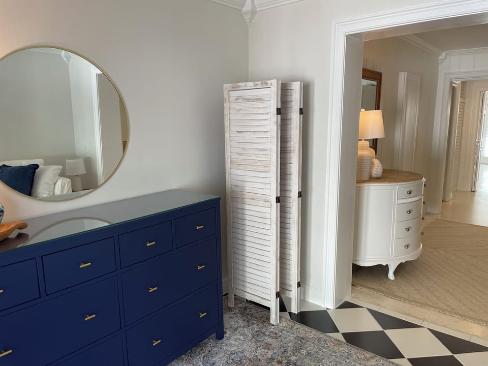 Sitting room/den converts to 3rd bedroom. Portable room divider creates privacy.