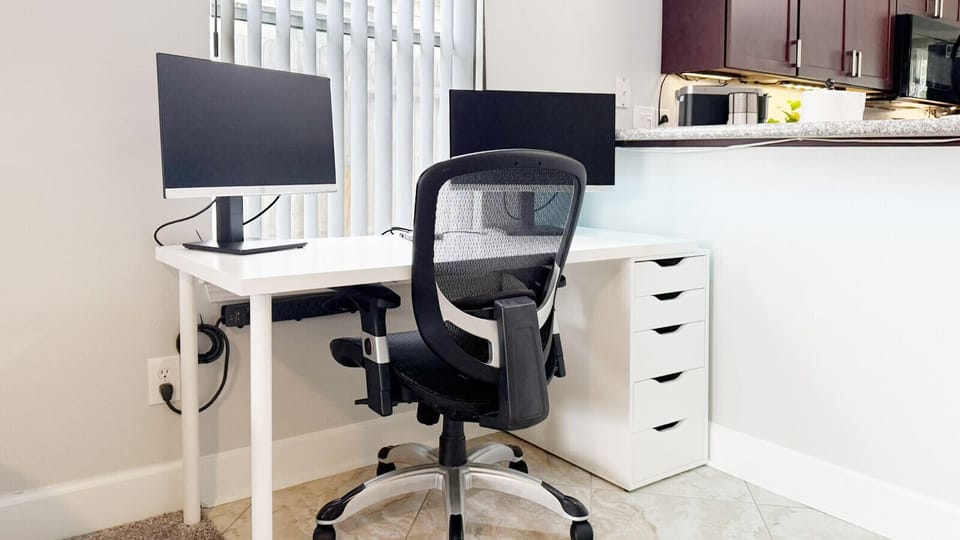 Remote workspace with dual monitors and adapter to hook them up!  Perfect for a `workation`