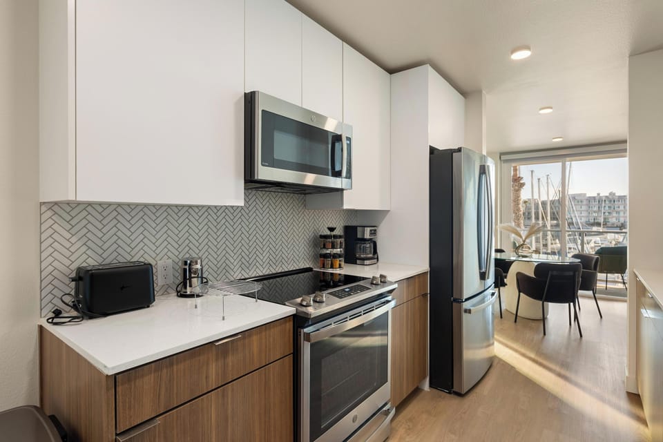 Kitchen (Close-up) – Focus on appliances and modern design.