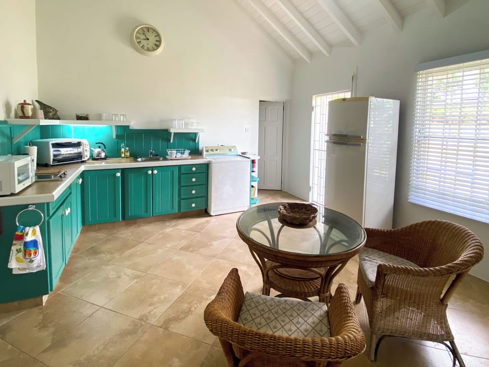 Spacious, light kitchen and dining area for easy meals. Laundry facilities.