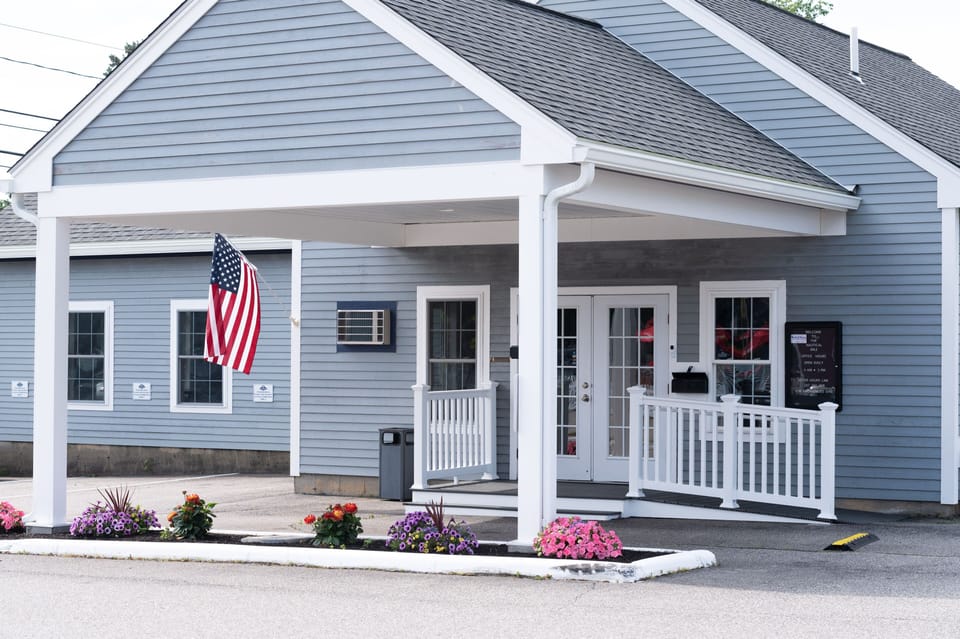 Charming entrance welcomes you with flowers and a sense of tranquility.
