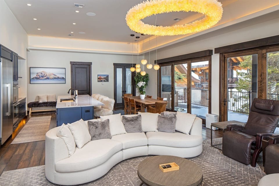 The open concept kitchen, living room & dining room provide a great gathering space for your group to connect | Main Level