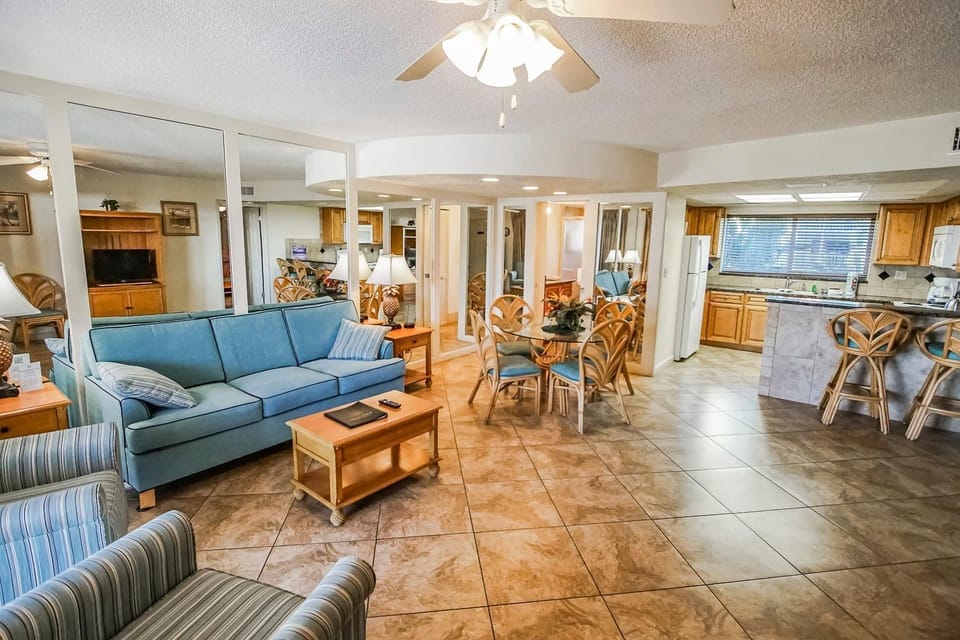 Featuring a fully equipped kitchen and a harmonious layout, this condo invites you to cook and dine while enjoying pool and ocean views.