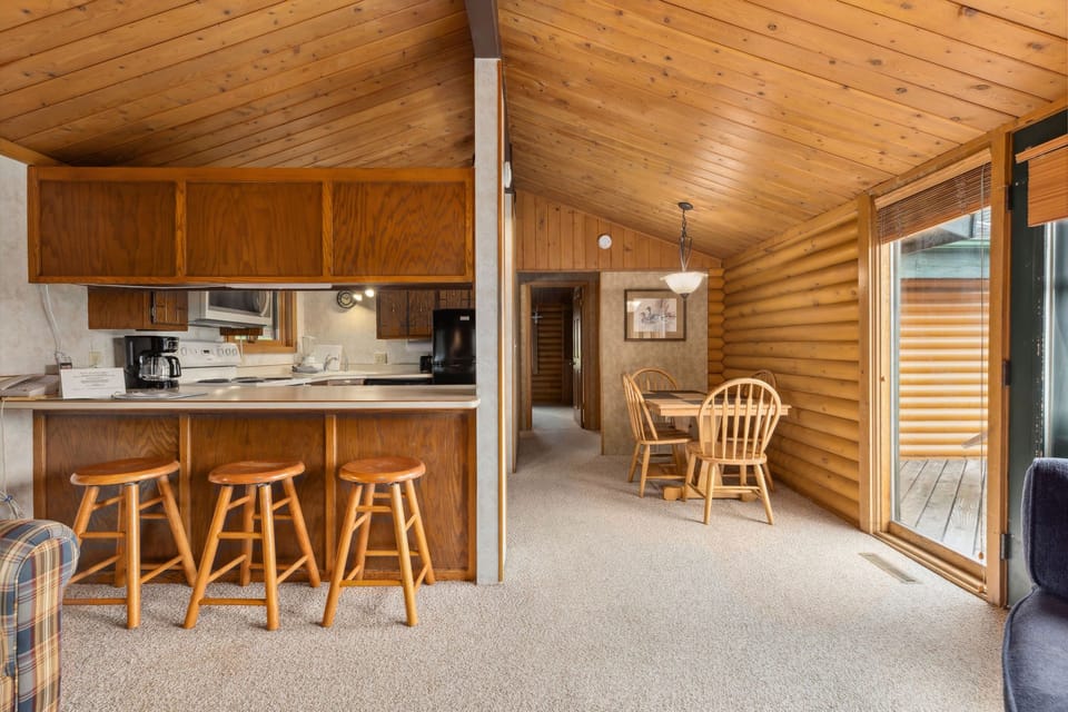 The spacious layout features comfortable seating and easy access to outdoor areas, ensuring every family member feels at home.