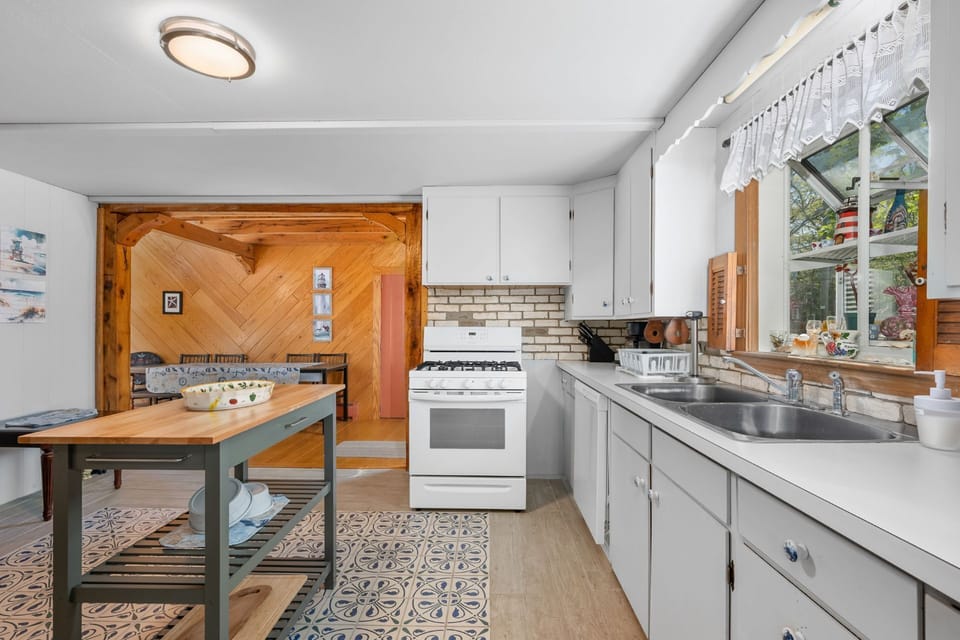 Fully equipped kitchen looking into the dining area