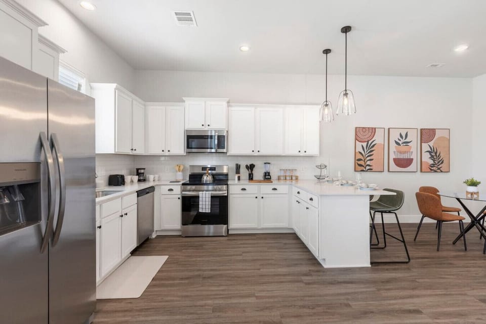Cook your favorites or try something new in this stylish kitchen made for gathering and creating.