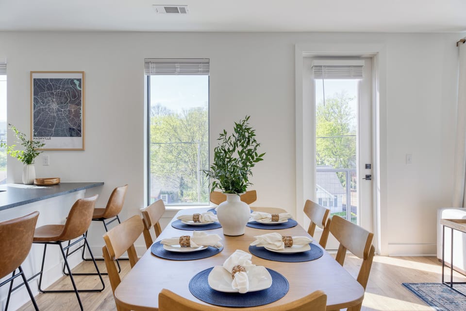 Gather around this modern table for shared meals or a quiet workspace.