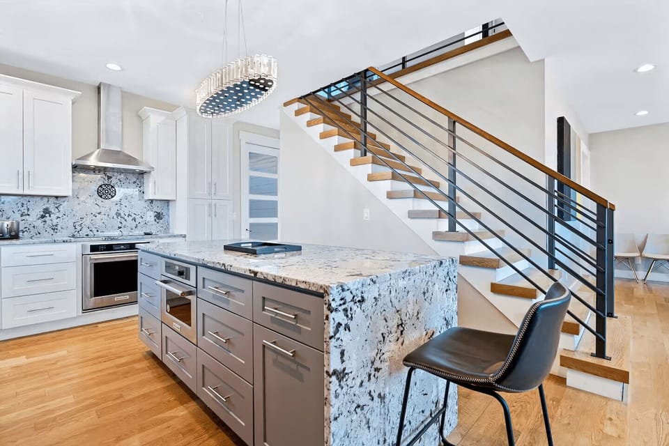 A chef’s dream, this open-concept kitchen combines contemporary design with smart appliances and elegant details for ultimate cooking ease.