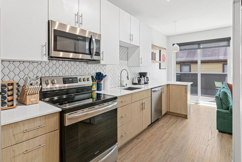 You can almost hear the sizzle of ingredients as you cook in the well-equipped kitchen, where every detail is designed for convenience.