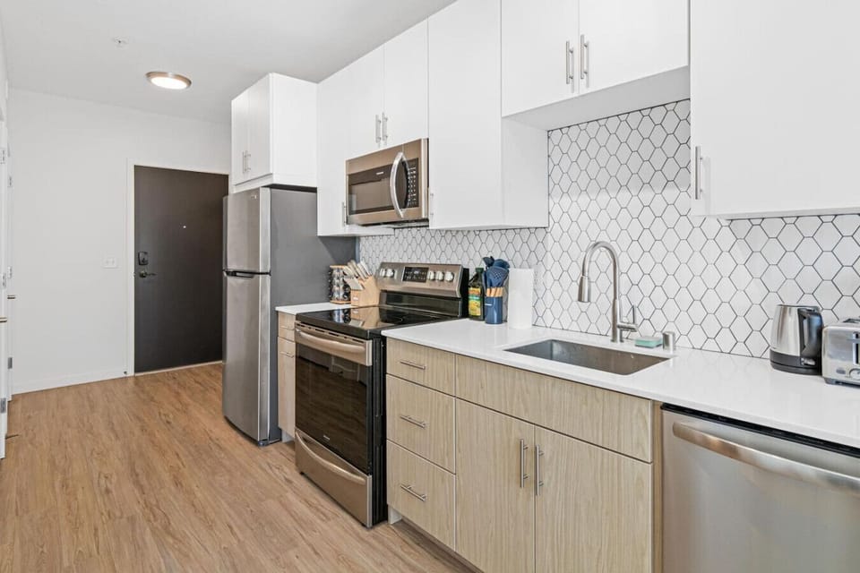 As you step into the kitchen, the clean lines and functional design make you eager to start cooking your favorite dishes.