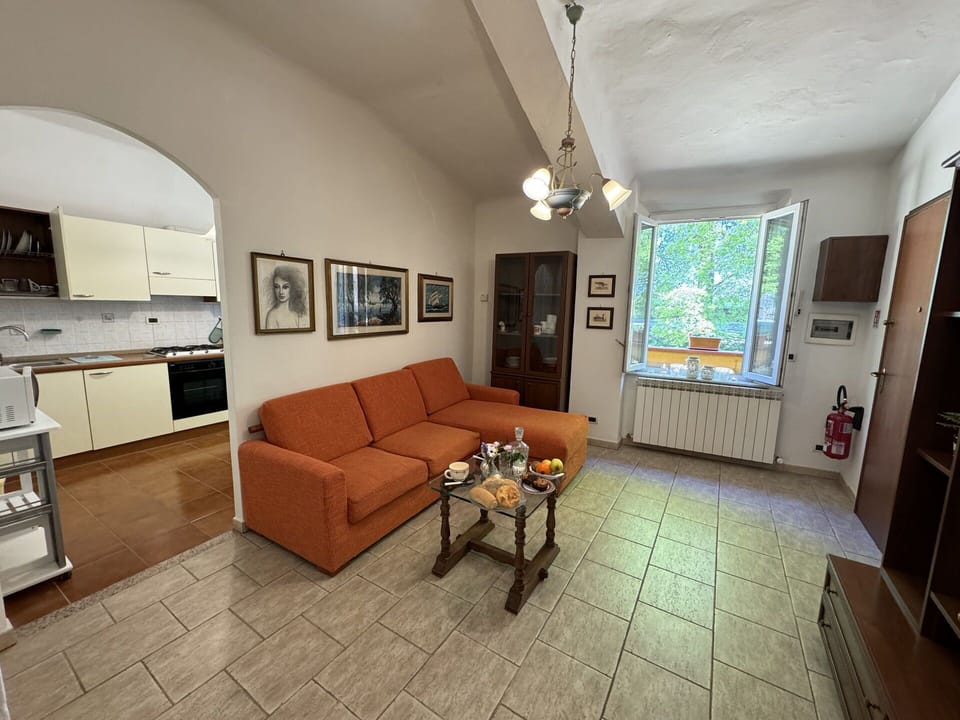 Furniture, Interior Design, Couch, Flooring, Apartment, Room, Floor, Ceiling, Living Room, Lighting