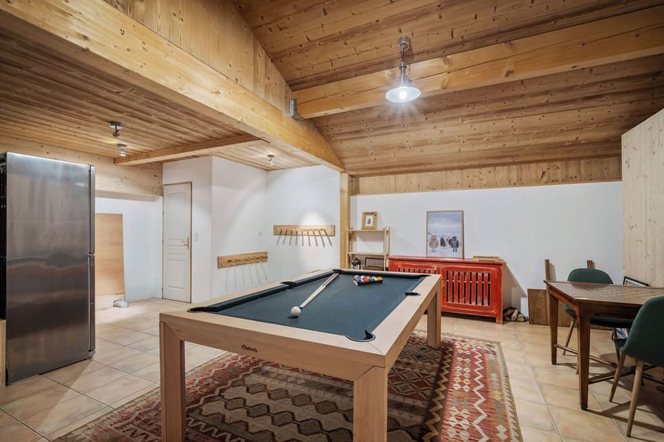 Pool table, ski room, wine fridge 