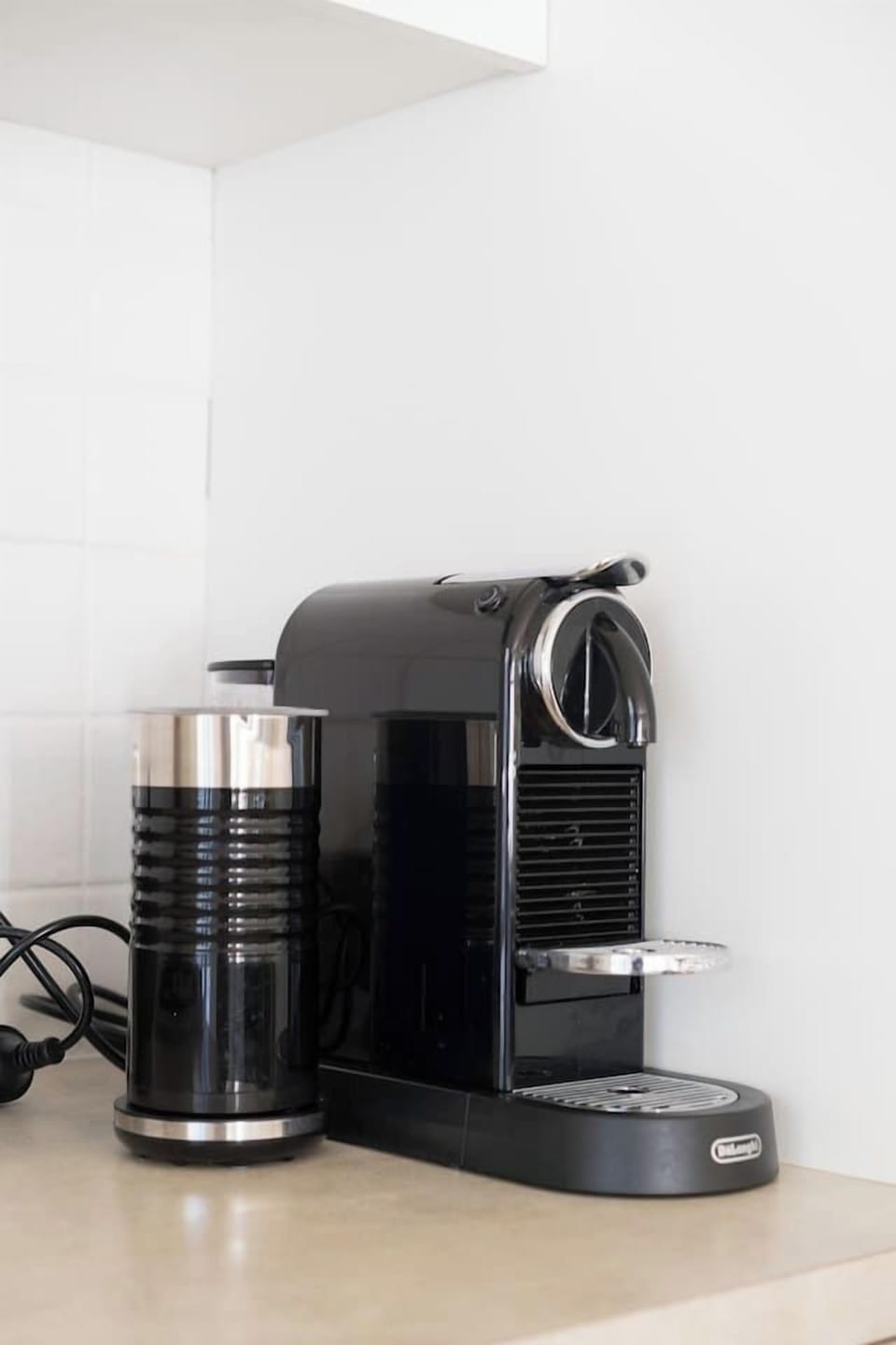 Barista-style mornings made easy with a coffee machine and a milk frother.