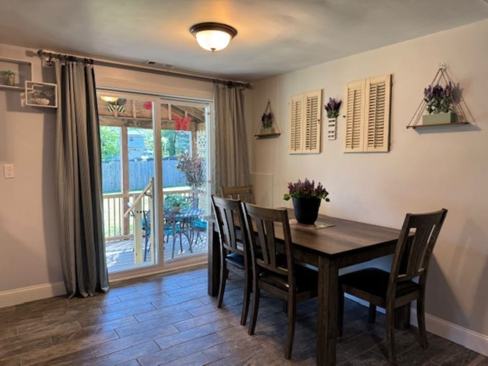 Dining room overlooking summer room