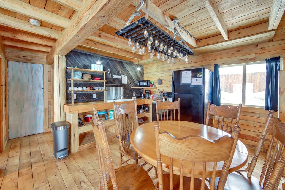 The kitchen and dining area is compact with everything you need.