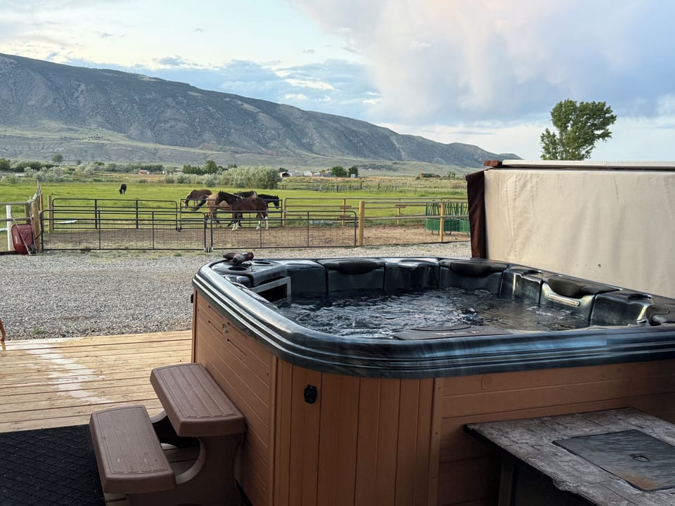 Enjoy a shared hot tub space with beautiful views