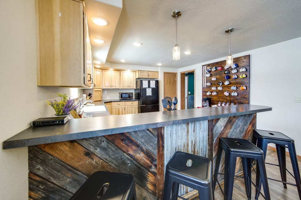 Pull up a stool and chat while meals come together in the open kitchen.