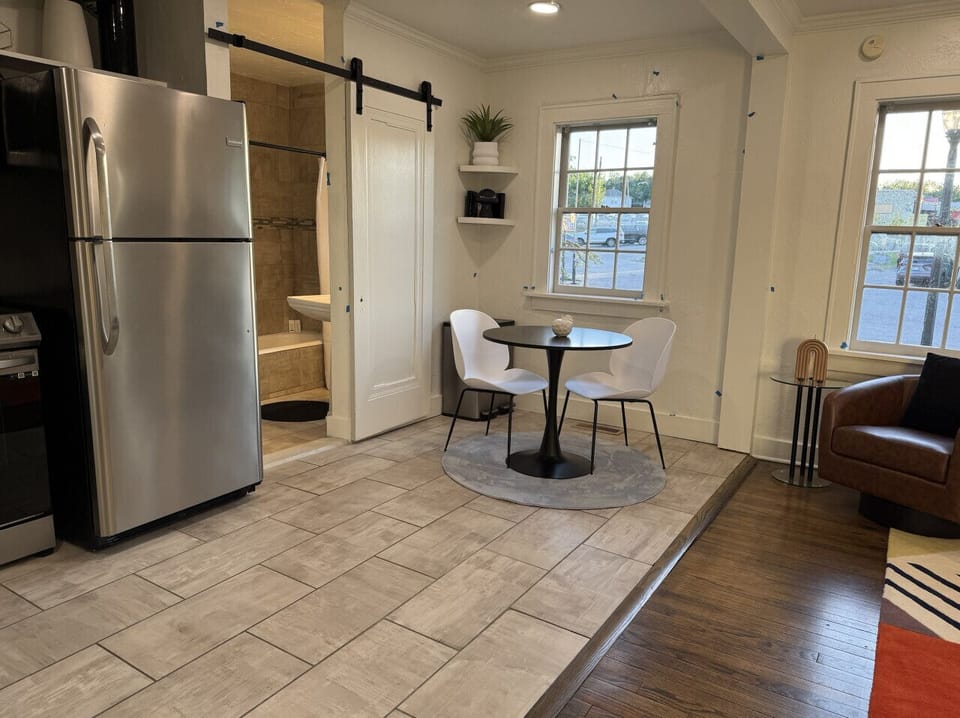 Walk-in bathroom/closet is located off the kitchen.