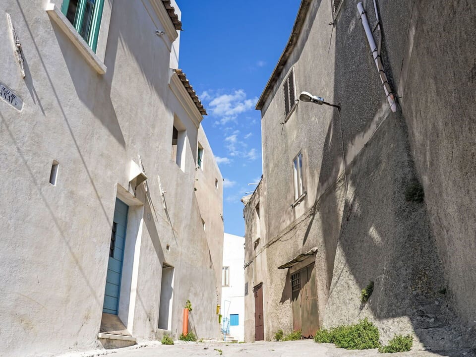 Blue, Wall, Neighbourhood, Alley, Architecture, Street, Human Settlement, Door, Concrete, Shadow