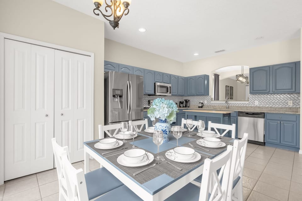 Open-Concept Kitchen With Island And Dining Area For Maximum Convenience