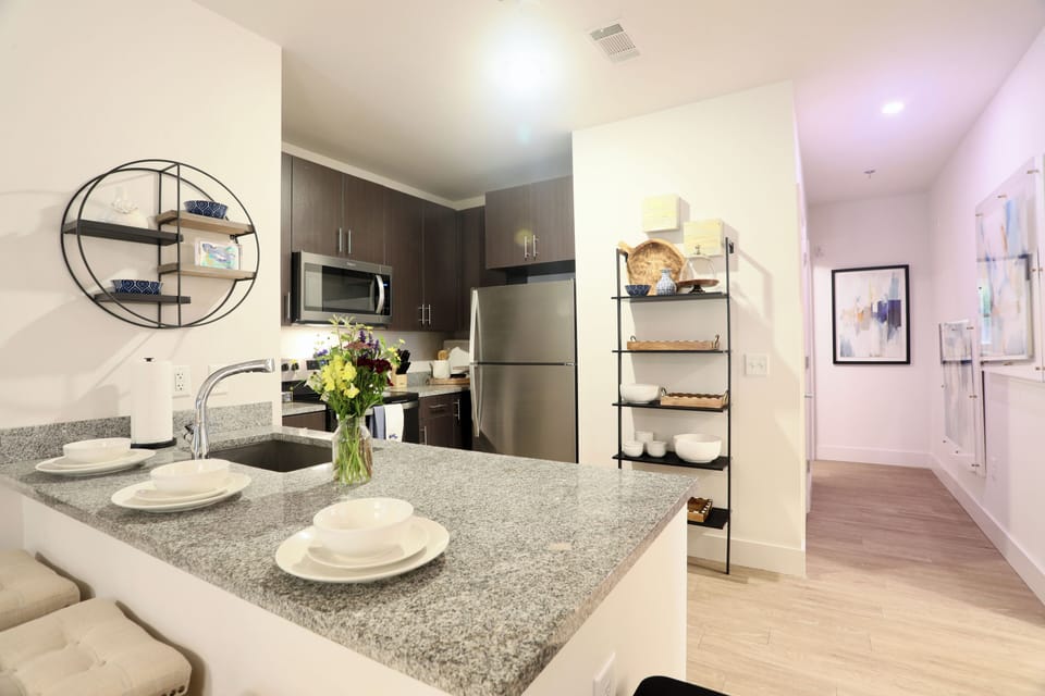Kitchen with updated dishwasher, oven, fridge, microwave