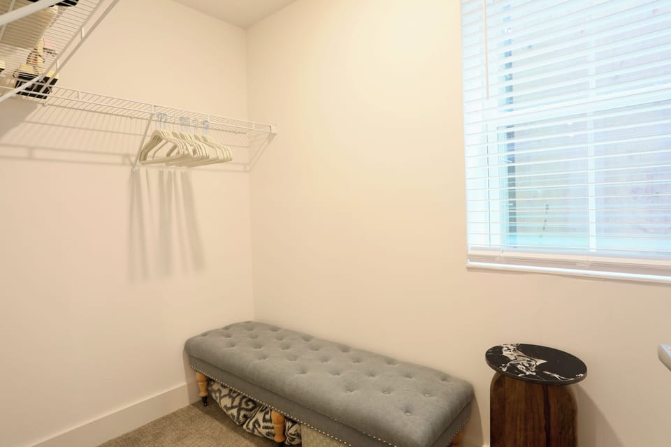 Extra large closet in master bedroom with plenty of storage