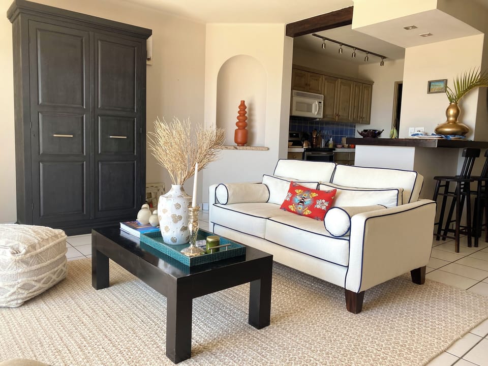 Cozy up in the restyled living room with ocean views & Netflix on demand